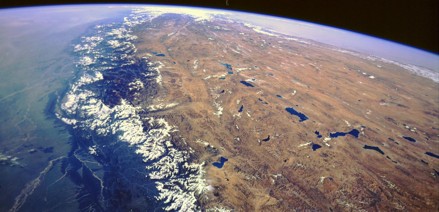 The HIMALAYAN MOUNTAIN RANGE from Kashmir in North-West India heading down toward the North-East; with the TIBETAN plateau to the right !